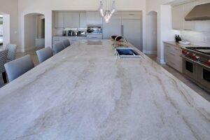 Modern kitchen with large quartzite island