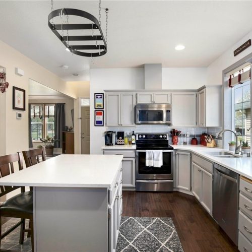 Custom Kitchen Remodel - White Quartz Countertop, White cabinets.