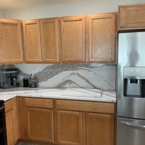 full-height-slab-backsplash Cambria Quartz Countertops with Full-Height Backsplash